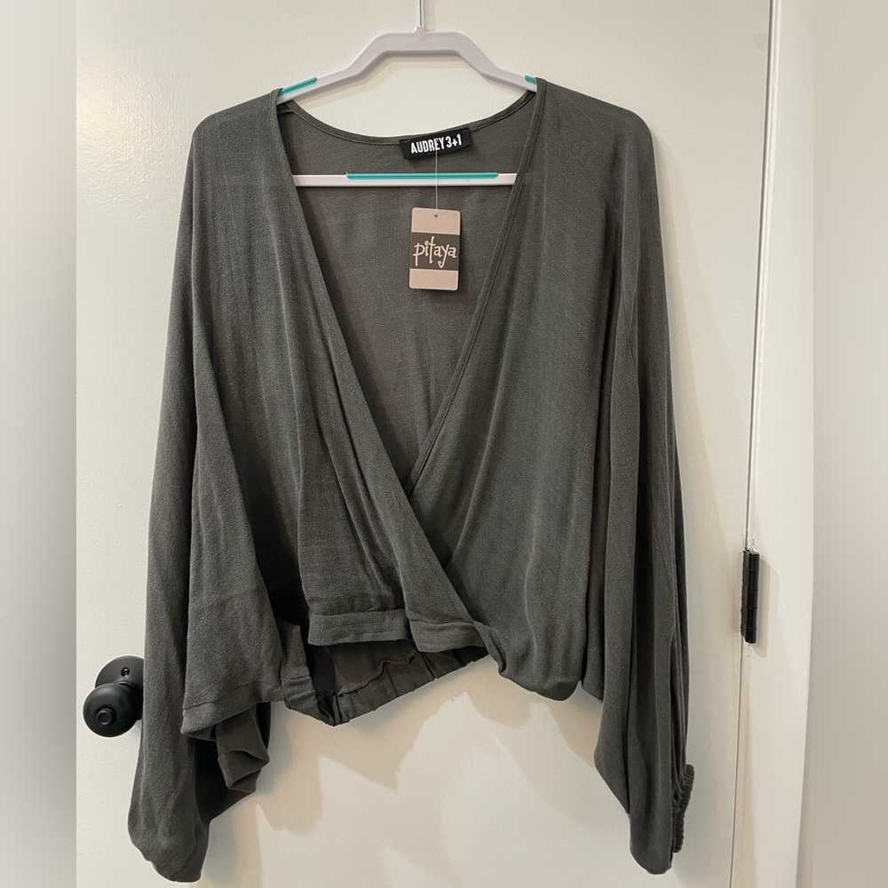 Charcoal grey blouse.